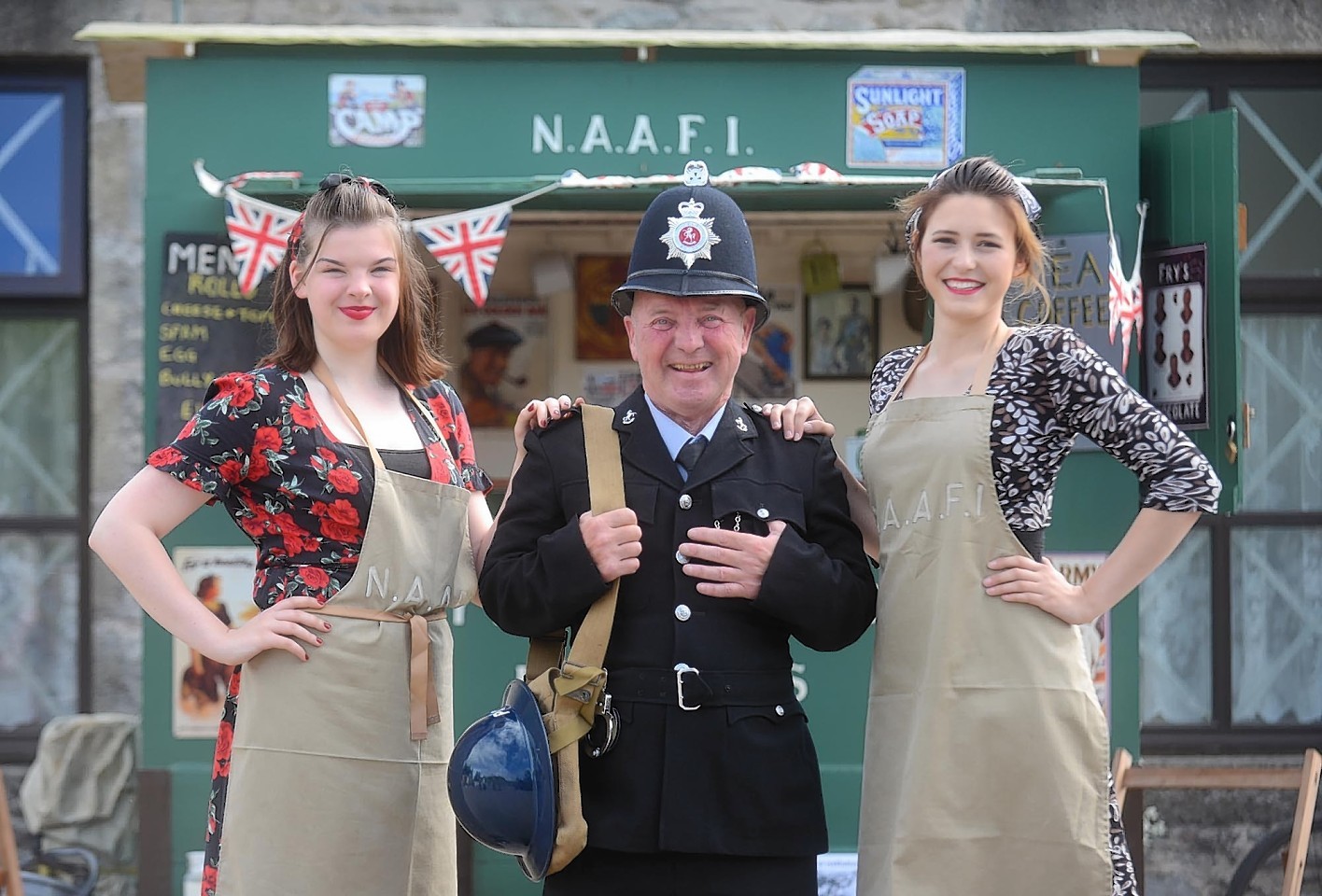 In photo from the left Roy Killen, Georgia Cassidy 19 (left) and  Ellie Inch 19 (right) NAAFI 