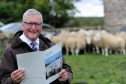 Fergus Ewing with the report last August.