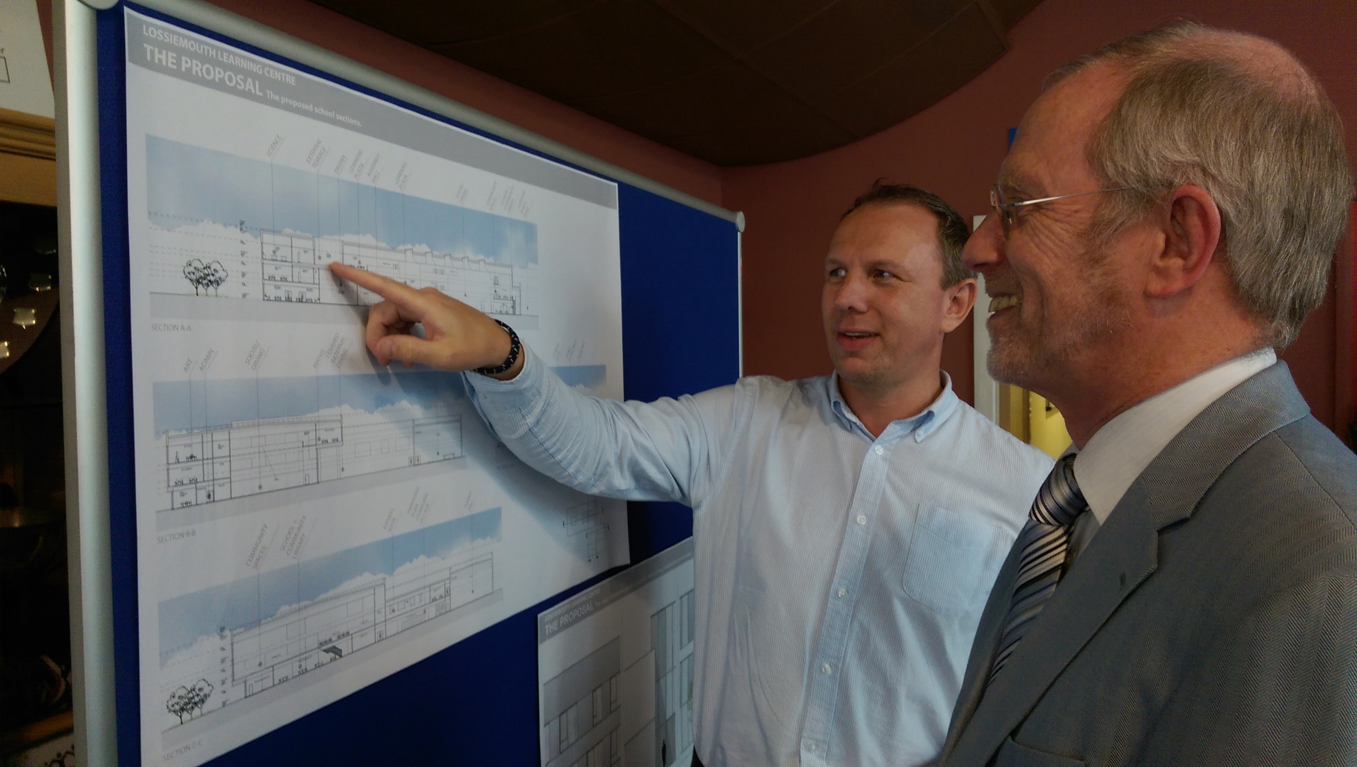 Architect Stewart Davie points out the features of the new school to deputy head teacher Bob Drysdale.