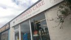 A charity tin containing about £20 was stolen during a break-in at Blythswood Care charity shop.