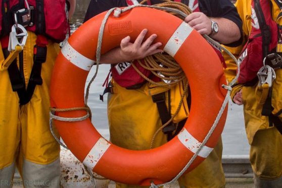 A member of Peterhead's lifeboat crew was suspended temporarily.