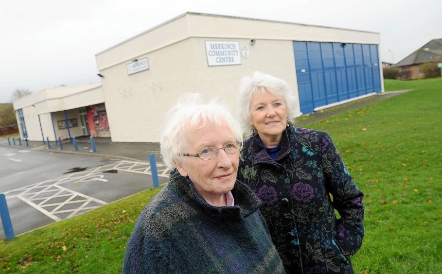 Anne McCreadie (left) pictured with Elsie Normington outside the Merkinch Community Centre.