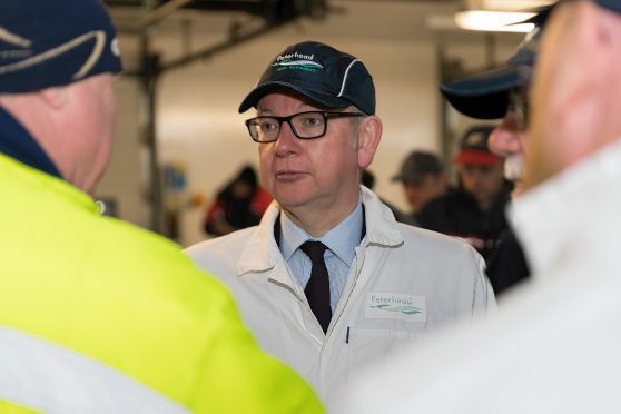 Michael Gove at Peterhead fish market