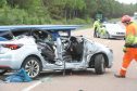 The scene of yesterday afternoon's accident on the A9 at the south Newtonmore junction involving two cars and an articulated lorry.