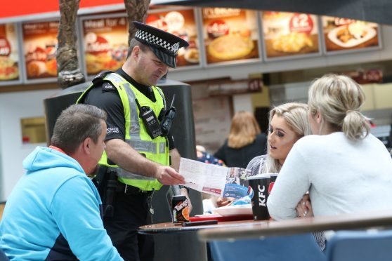 Police handing out anti-terrorism leaflets in the Eastgate shopping centre and Inverness town centre