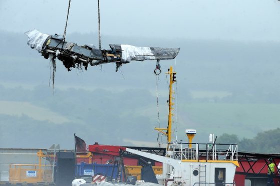 The wreckage of the two crashed RAF Tornados being brought to shore