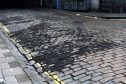 The tar over the cobbles on Windmill Brae, Aberdeen back in September last year