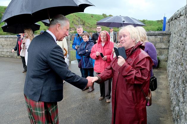 The Duke of Rothesay chats to Edna Anderson as he visited and opened the Sail Loft Bunkhouse at Portsoy. (Picture: Colin Rennie)