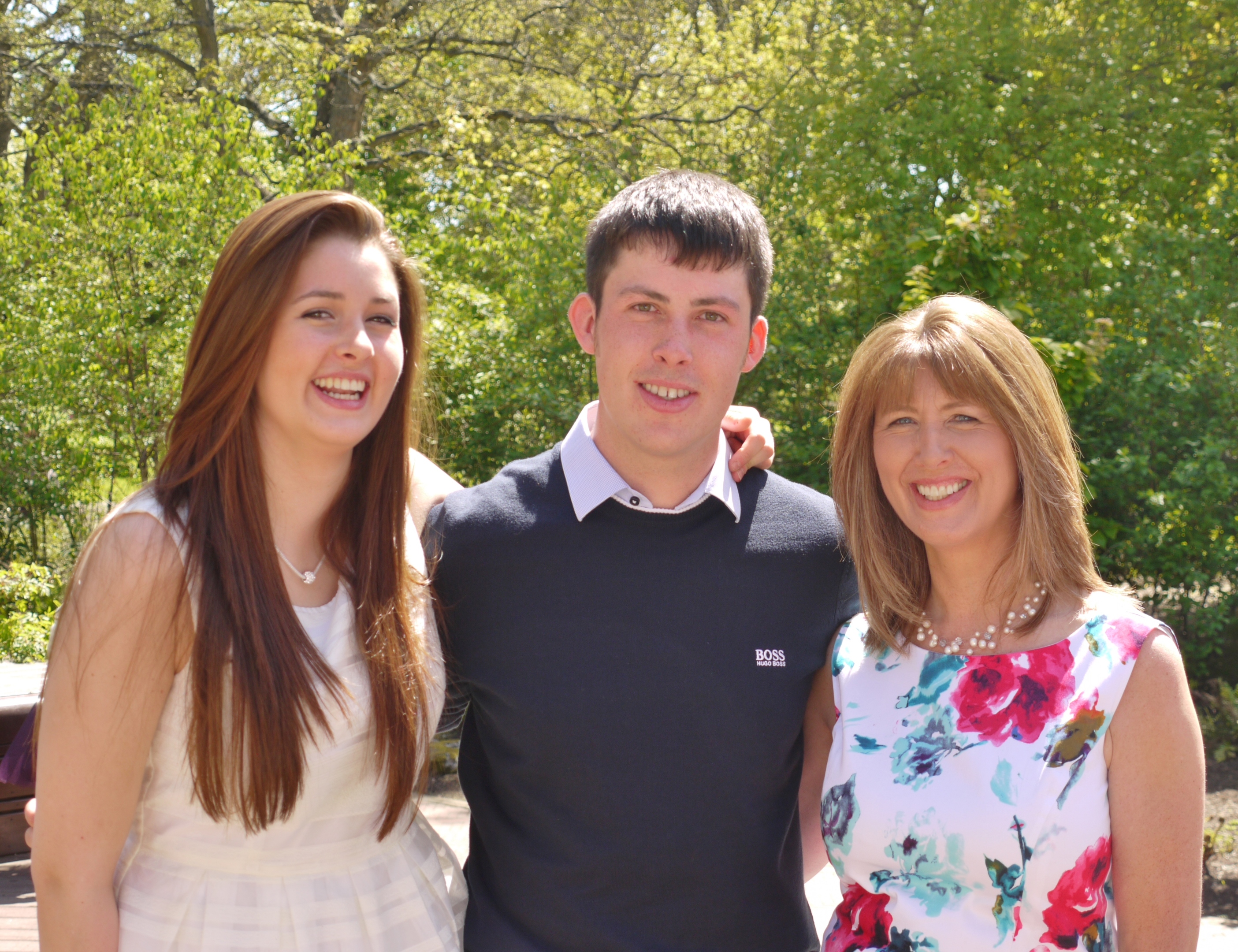 Eileen Buchan (right) pictured with her daughter Sarah, 23, and 26-year-old son Scott.