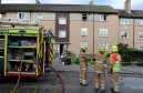 A mother and daughter escaped a flat gutted by fire this evening in Mastrick.