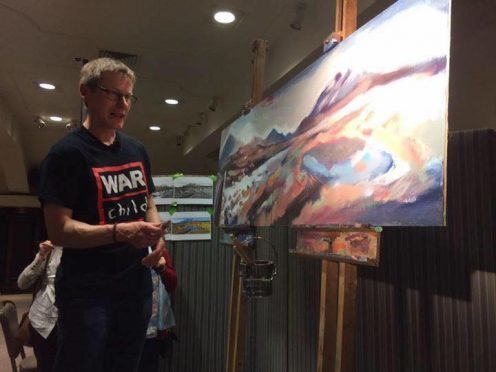 Artist Mike Sampson at the live painting event