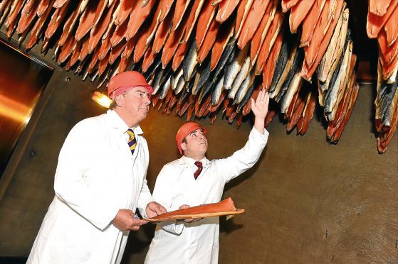 Andrew Leigh, founding chairman, and his son Christopher Leigh, managing director, who receive the Queen's Award for their  smoked salmon company John Ross Jr. 

Picture by KEVIN EMSLIE