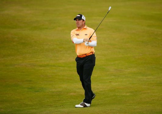 Richie Ramsay hits his second shot on the 8th hole during the second round of the 146th Open at Royal Birkdale.