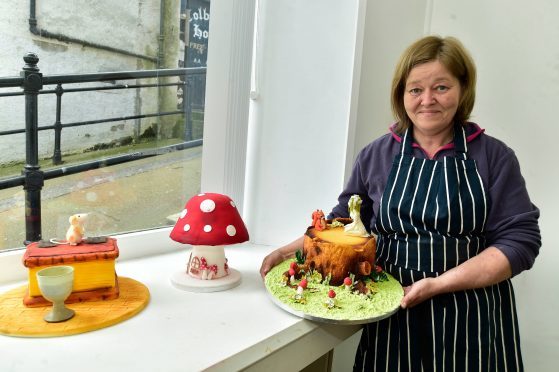 Angela Wiseman with some of her cakes