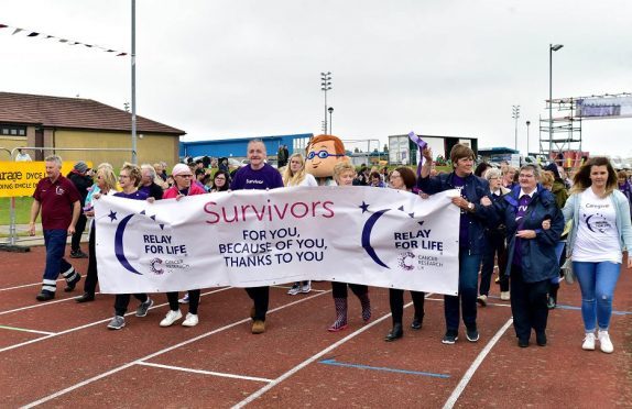 Survivors get the Relay for Life 2017 underway.