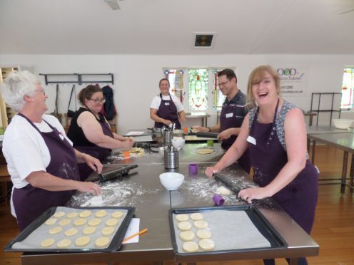 The would-be bakers made scones and biscuits during the class.