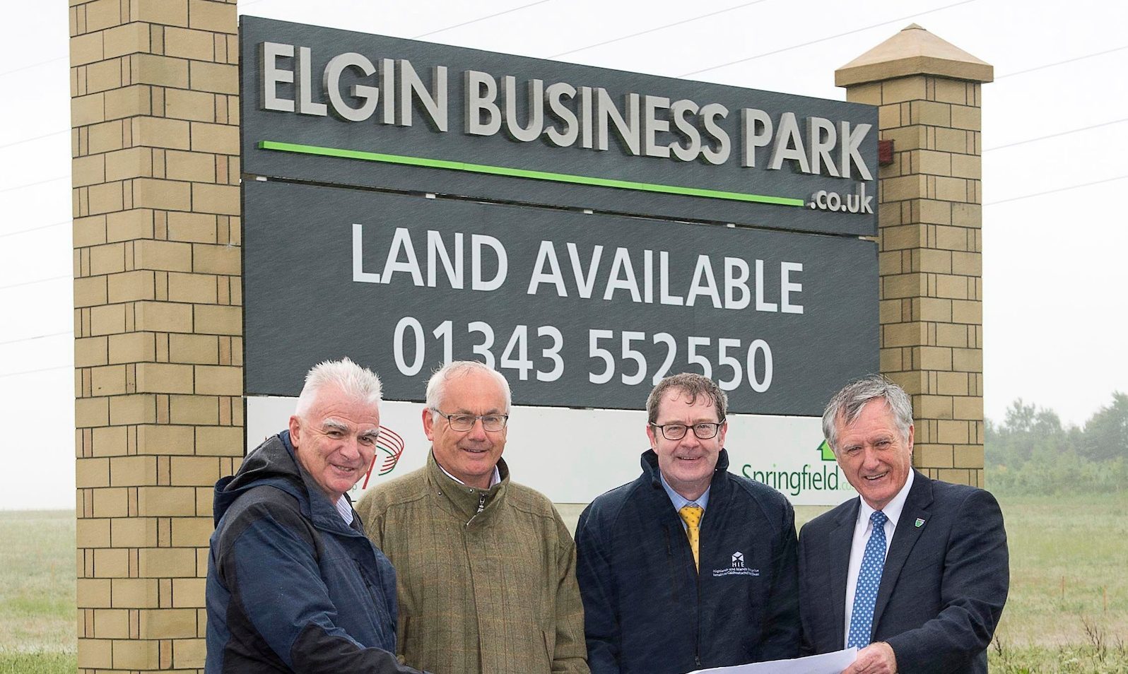 Left to right: Sandy Adam and Alan Esson  both of Springfield Properties,
David Oxley, acting director of business growth at HIE, and councillor John Cowe.