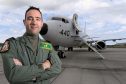 Picture by SANDY McCOOK 13th July '17
The Defence Secratary yesterday announced the Squadrons who will fly the new P-8A Poseidon Maritime Patrol aircraft from RAF Lossiemouth when they come in to service in the coming years.     Wing Commander James Hanson newly appointed Officer in Command of 120 Squadron photographed with an American Poseidon.