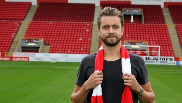 Ex-Aberdeen defender Kari Arnason.