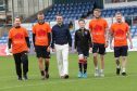Left-to-right: Ross County video analyst Fraser Gorman, manager Jim McIntyre, Maggie's fundraising manager Andrew Benjamin, Alasdair Urquhart, Ross County defender Marcus Fraser and winger Michael Gardyne.