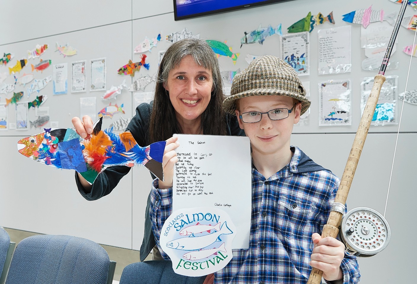 Poetry winner Charlie Cartlidge (11) from Inverness with Festival Chairwoman, Dr Melanie Smith, Inverness College UHI.