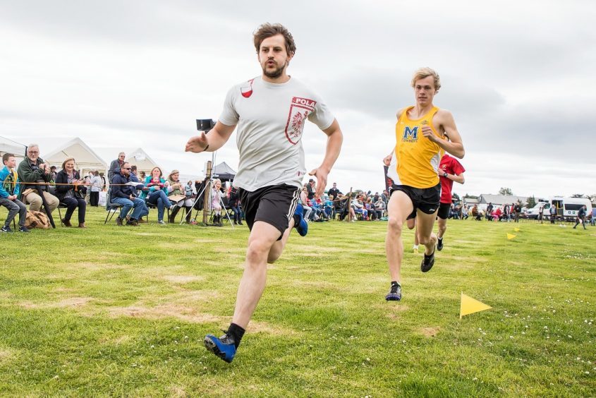 Competitor crace in the high 800m's at the Tain Highland Gathering.
