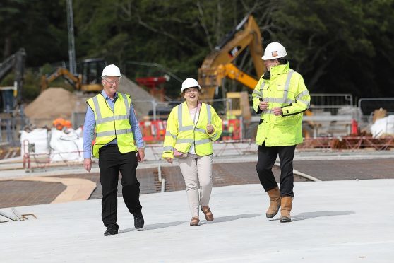 31 July 2017: Councillors Allan Henderson, left, and Trish Robertson were given a tour of the West Link bridge and the new Highland Rugby Club building by Highland Council's head of infrastructure Colin Howell, right. Picture: Andrew Smith