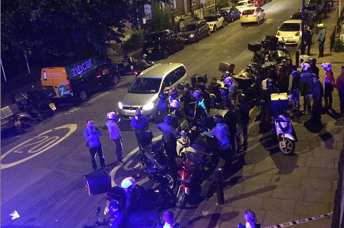 Police at the scene of one of last week's acid attacks in London