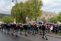 The Ballater and District Pipe band at last year's Duck Race in aid of Victoria Week