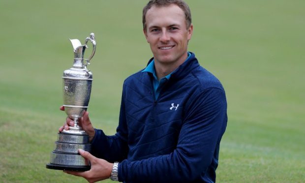 Jordan Spieth finished three shots ahead of Matt Kuchar to win the Claret Jug.