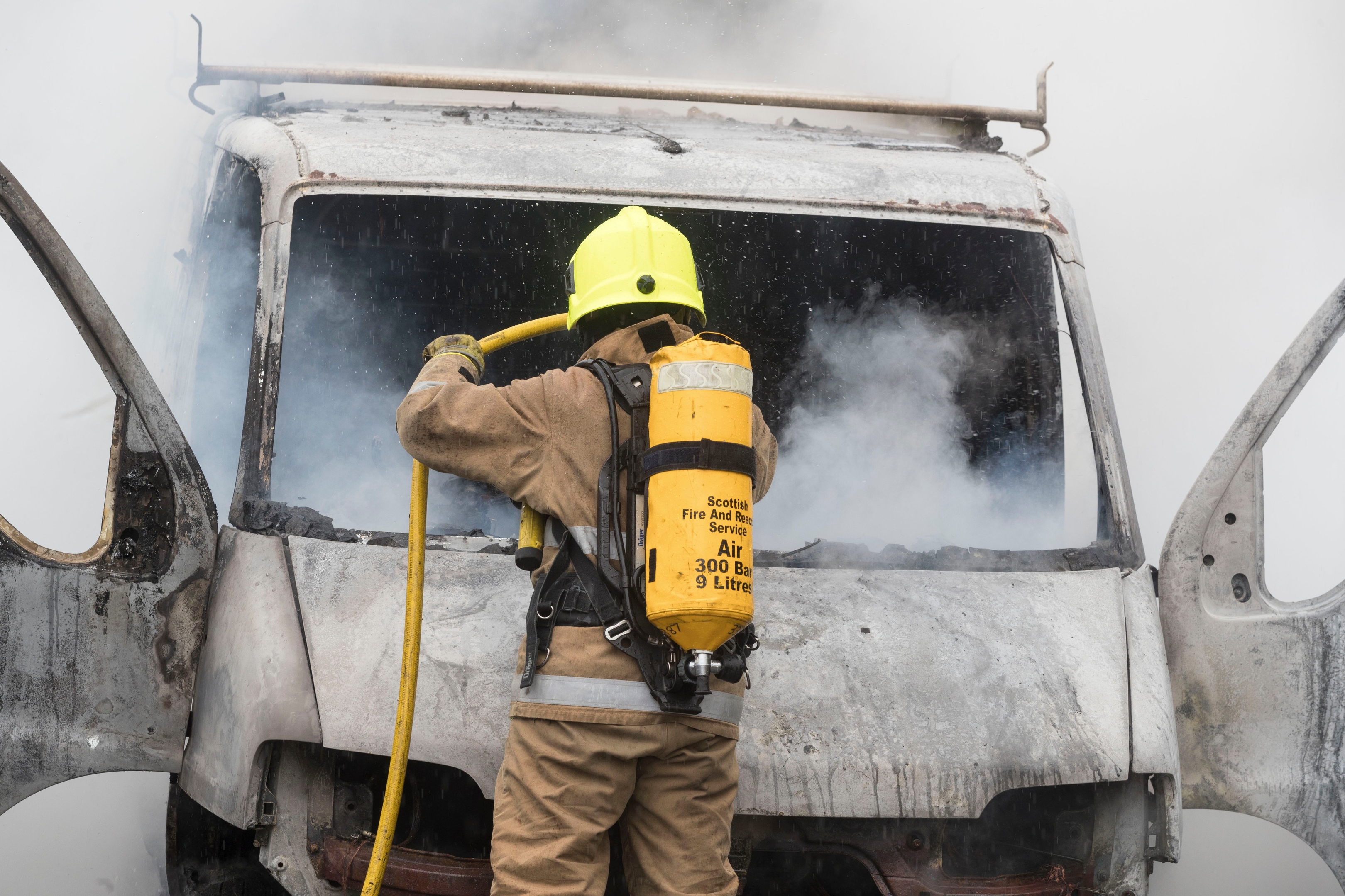 Firefighters put out the van blaze