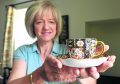 Property manager and head gardener, Susan Burgess with some crockery.