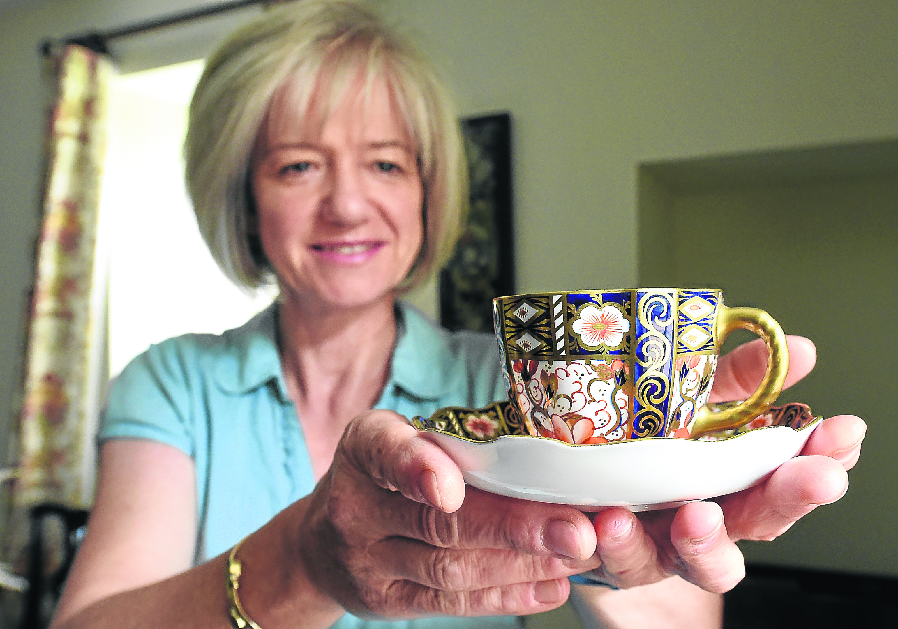 Property manager and head gardener, Susan Burgess with some crockery.