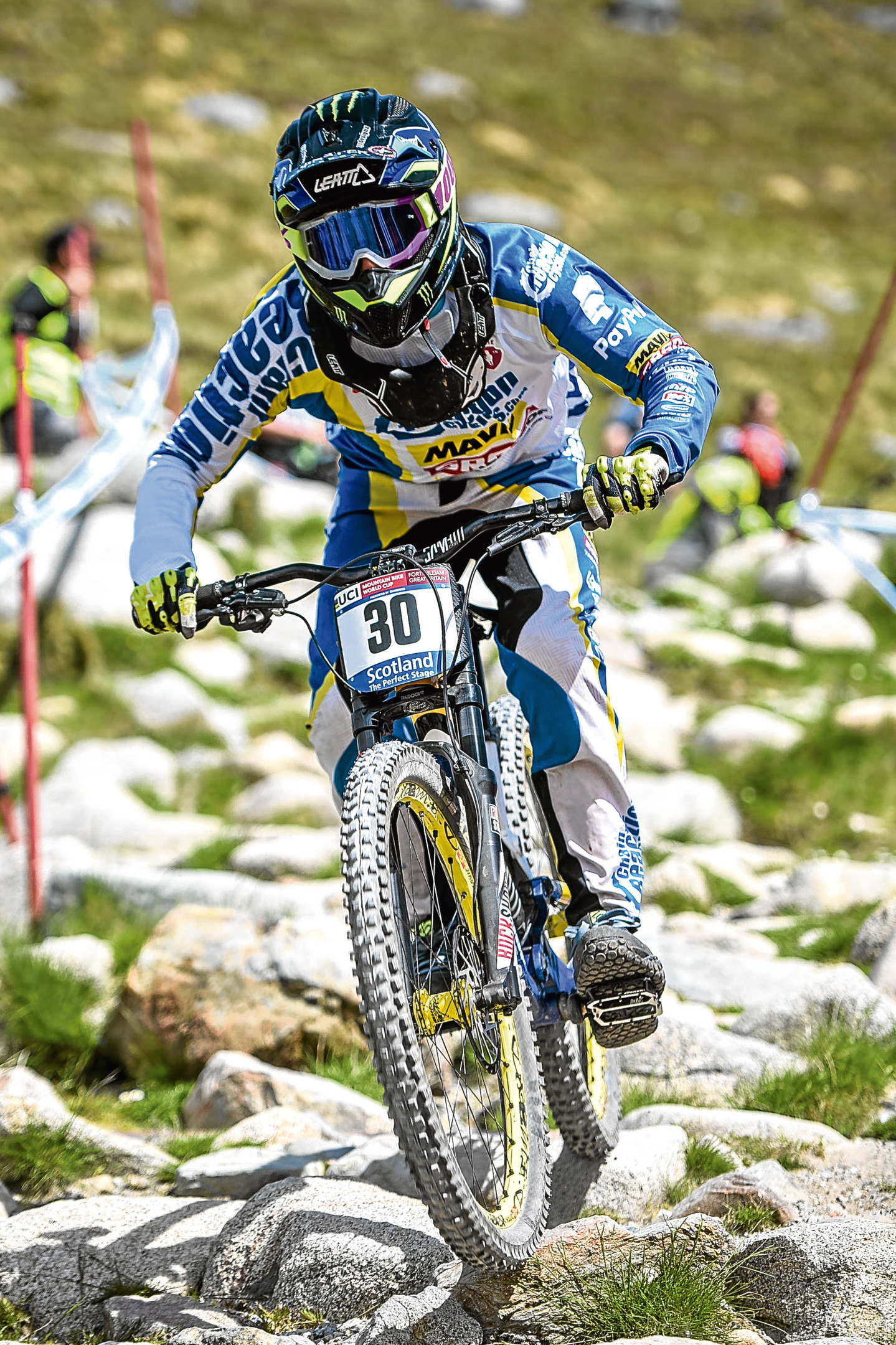 A rider passes through a rock garden during a practice session at Round 3 of the UCI Mountainbike World Cup at the Nevis Range in Fort William, Highlands on June 03 2016. The venue was added to the World Cup circuit in 2003 and has featured every year since. The 2.8km track is situated on Aonach Mor, the UK's ninth highest mountain.