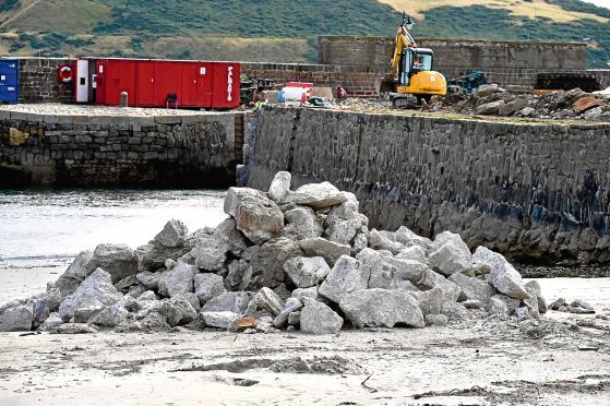 The debris from the collapsed wall