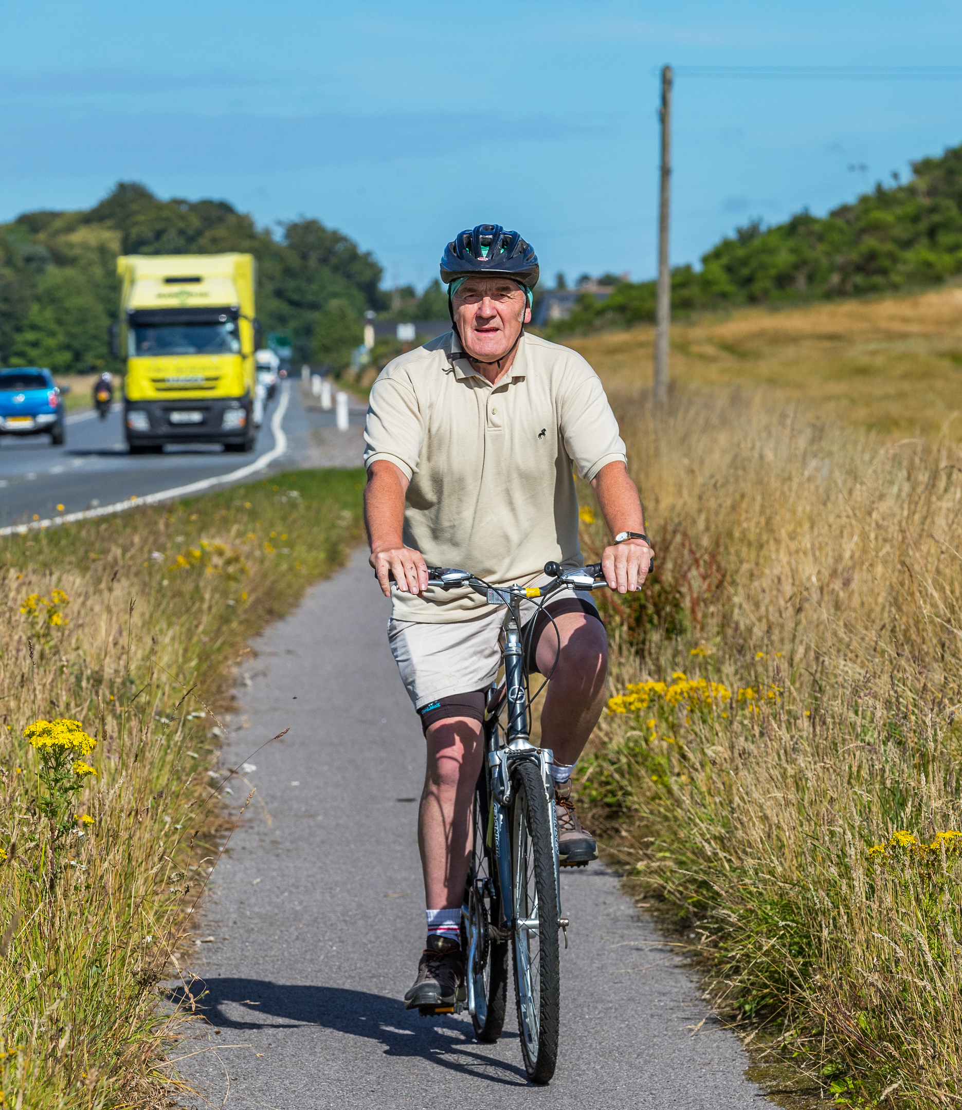 Council leader George Alexander cycled from Forres to the meeting to show his support for the plans