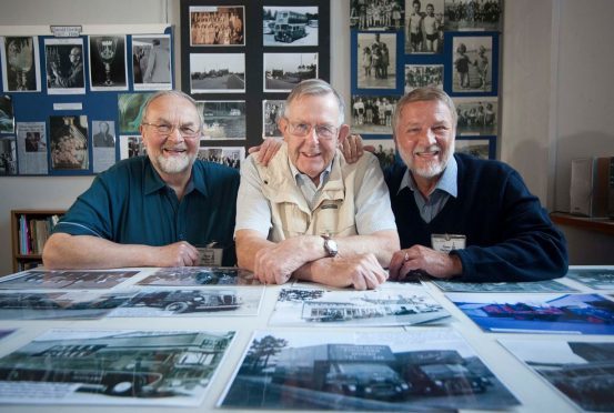 Forres Heritage Trust volunteers Franny Duncan, Ross Dalziel and Ray Mills with just some of the photos that are on display.