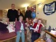 Mollie McNeill with her family at her 80th birthday party in the Dail Mhor care home in Strontian last year.
