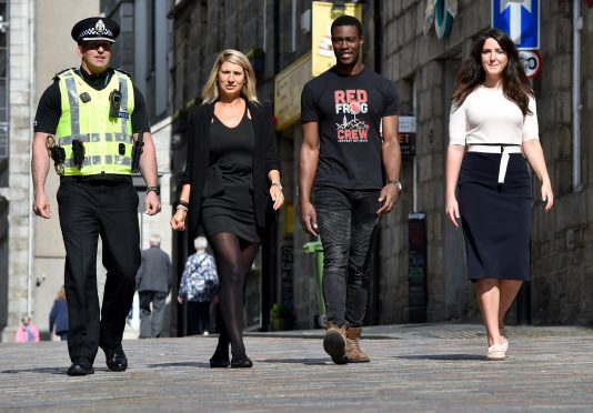 Picture of (L-R) Inspector Stuart McAdam, Sarah Wheeler (chair of Unight), Charles Ogboke (student welfare organisation Red Frogs), Nicola Johnston (Aberdeen Inspired Evening & Night Time Economy Manger). Picture by Kenny Elrick.