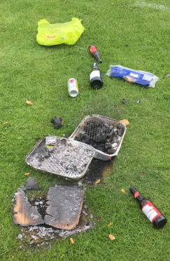 Rubbish from a picnic lies strewn across Harlaw playing fields.