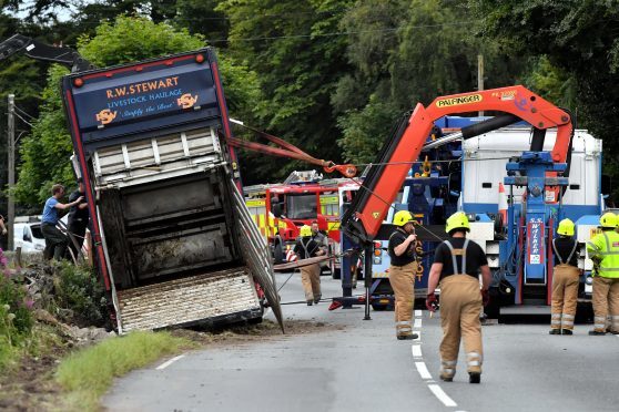 Emergency services attend an RTC on the A944 near Loch of Skene where a cattle lorry has went off the road.     
Picture by Kami Thomson    03-08-17