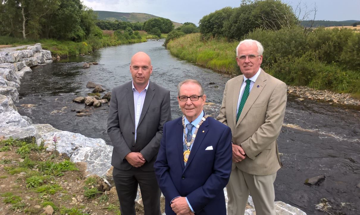 Aberdeenshire Council Project Manager, Gavin Penman; Deputy Provost Ron McKail; and Leader of the Council, Jim Gifford at the formal opening of Huntly’s Flood Protection Scheme.