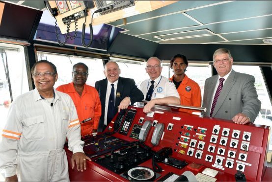 he Malavia Seven at Aberdeen Harbour - Lord Provost Barney Crockett visited the ship and spoke to the captain and crew. (from left) Captain Lal Bihari Singh, Bamadev Swain, Lord Provost Barney Crockett, Pastor Howard Drysdale, Rahul Sharma and Ian Robbie, Treasurer for the Aberdeen Seafarers Centre.
Picture by COLIN RENNIE