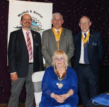 (from back l-r) John Glascodine, secretary; Les May, vice president and David Jackson, junior vice president, Moira Gordon, president.