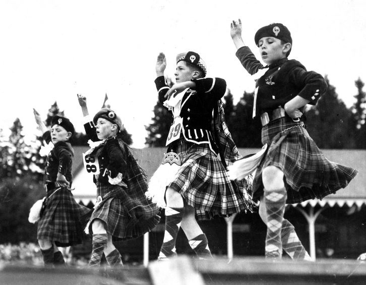 Highland dancers compete for honours at the Braemar Gathering in 1952.