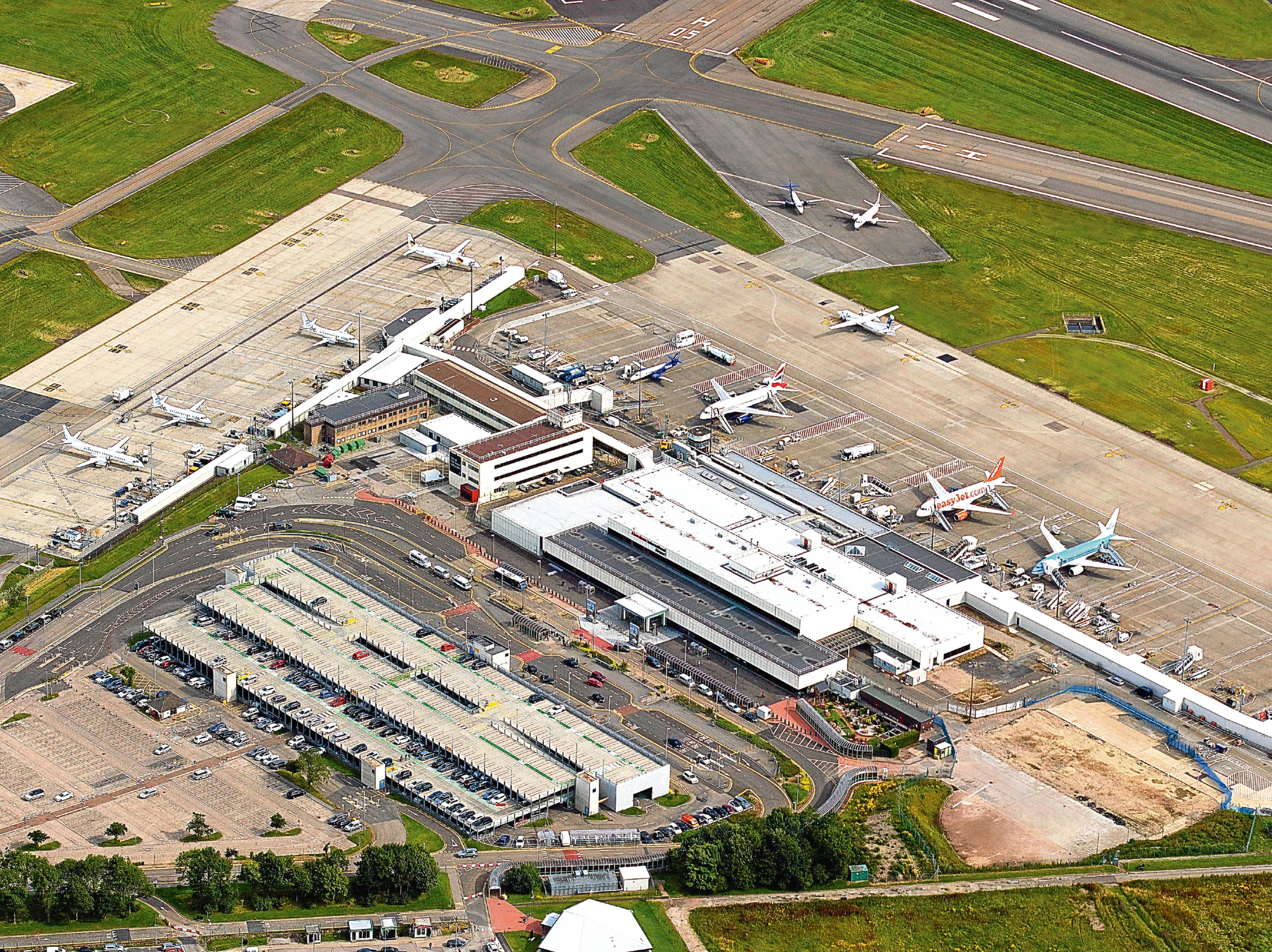 The developers plan to build hundreds of council homes near Aberdeen International Airport.