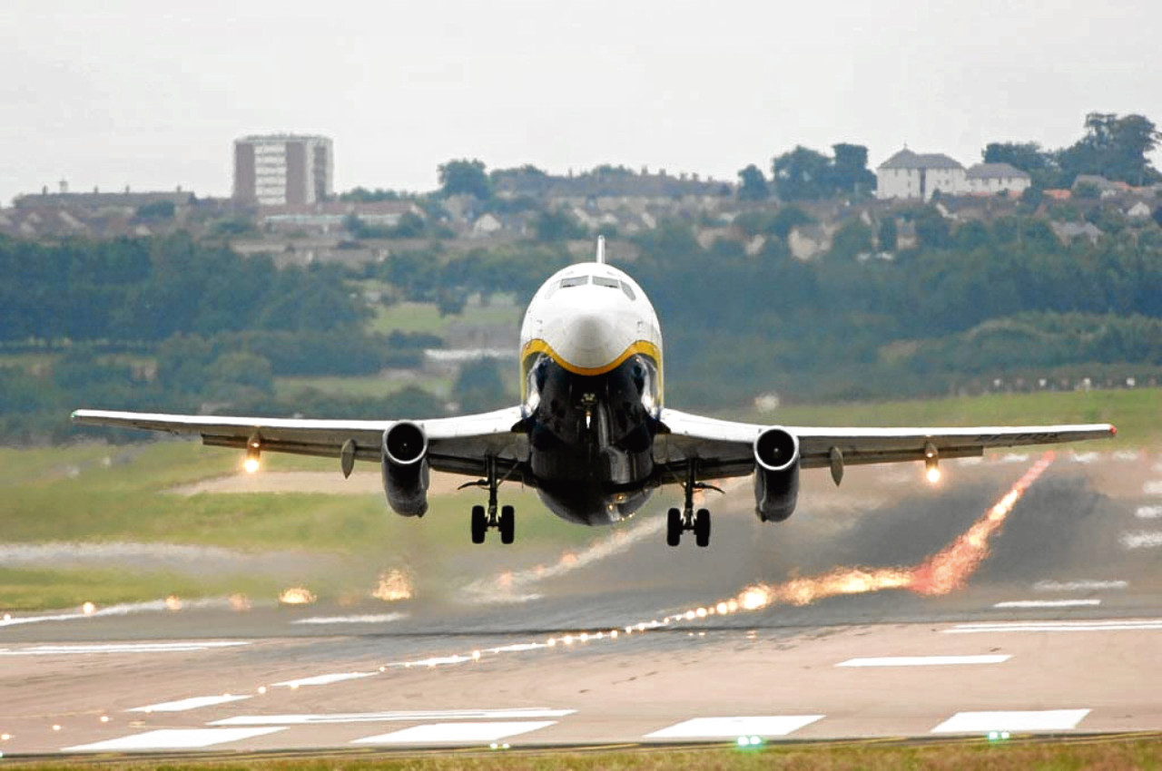 Ryanair plane landing at Aberdeen Airport.