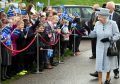 The Queen meets youngsters from Abbotswell primary school  outside Sue Ryder, Dee View Court in Kincorth. Pic by Jim Irvine.