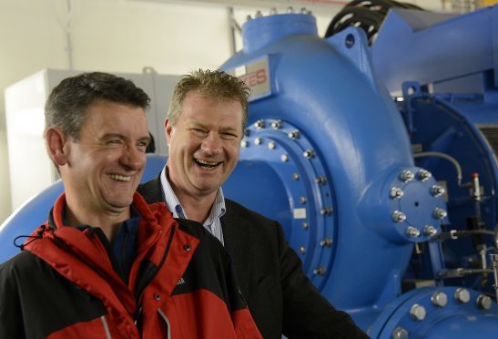 Torridon Mountain Rescue Team member Richard Cockburn (left) with Hans Bunting, Chief Operating Officer, Renewables innogy SE in the Grudie Hydro Electric scheme power station.