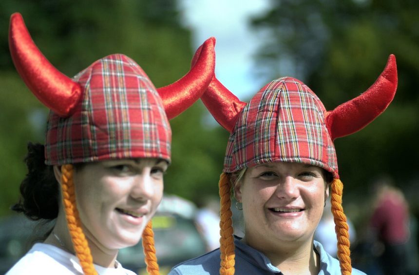 Louise Brisley and Vicky Walton from Salisbury with their Viking hats in 2003.